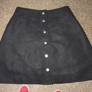 A black button down skirt